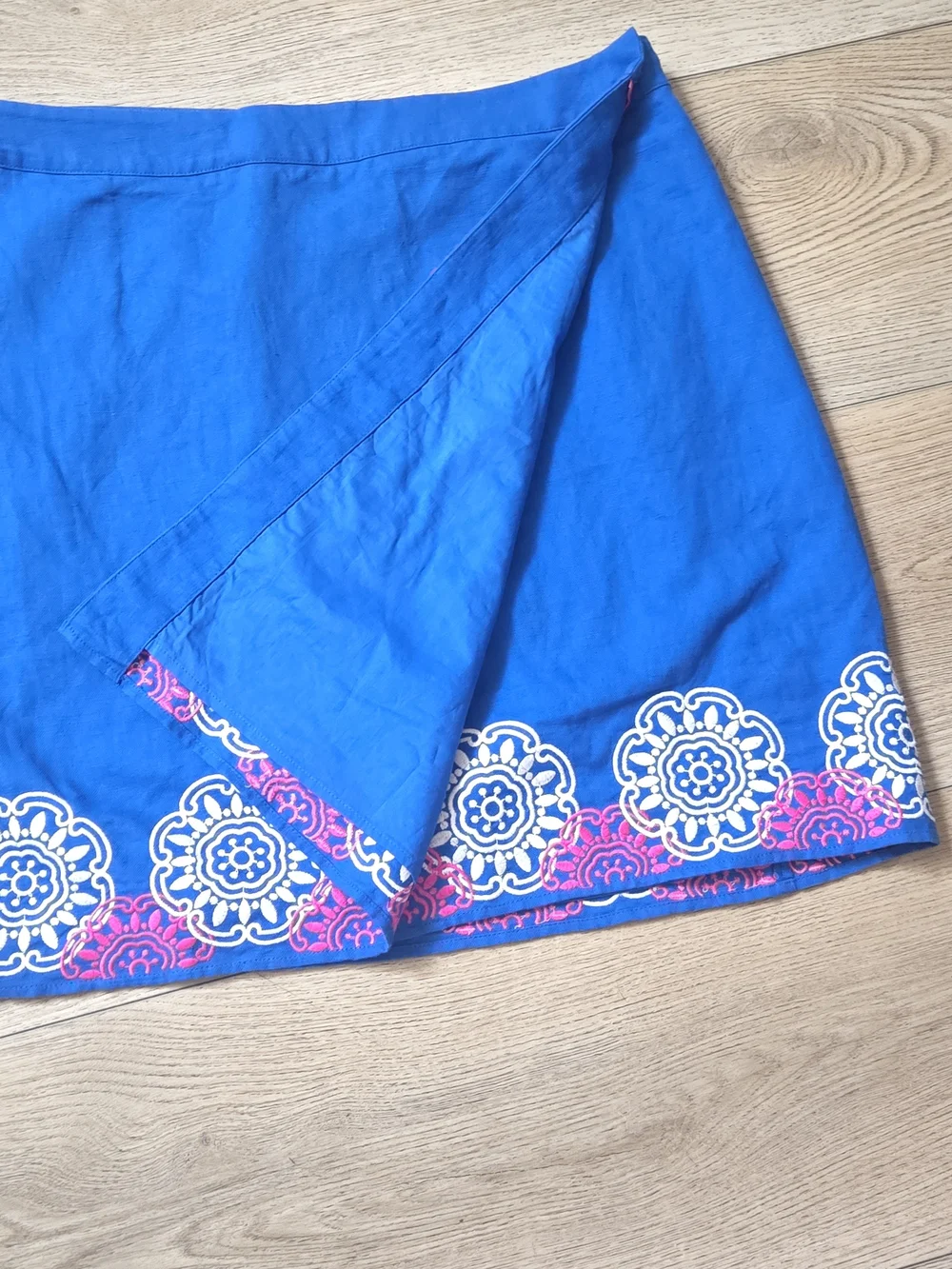 Boden Blue Mini Wrap Skirt with Pink  And White Embroidery Floral Border.